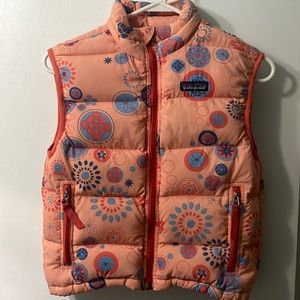 Patagonia orange floral puffer vest, size 7/8